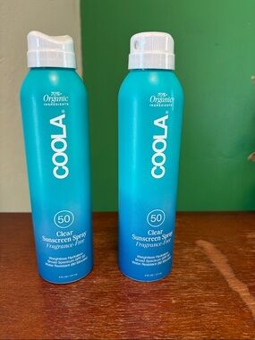 COOLA Clear Sunscreen Spray SPF 50 - Teal Blue Bottle